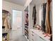 Organized closet with shelving, drawers, and ample storage for clothing and accessories at 1603 Cottagewood Dr, Brandon, FL 33510