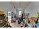 A cluttered garage space filled with various tools and equipment at 1603 Cottagewood Dr, Brandon, FL 33510