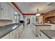 Spacious kitchen with granite countertops, white cabinets, and stainless steel appliances at 1603 Cottagewood Dr, Brandon, FL 33510
