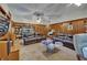 Comfortable living room with built-in bookshelves, cozy sofas, and natural light at 1603 Cottagewood Dr, Brandon, FL 33510