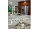 Close up of the kitchen island with granite countertops and stainless steel faucet at 1748 Ragland Ave, Clearwater, FL 33765