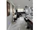 Bright and airy living space with an open floor plan, and access to the kitchen at 1748 Ragland Ave, Clearwater, FL 33765