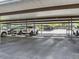 A covered car port offers assigned parking and protection from the elements at 2700 Cove Cay Dr # 1-2D, Clearwater, FL 33760