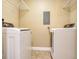 Laundry room with a side-by-side washer and dryer at 2700 Cove Cay Dr # 1-2D, Clearwater, FL 33760
