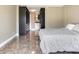 Main bedroom featuring dark closets with bathroom access at 2700 Cove Cay Dr # 1-2D, Clearwater, FL 33760