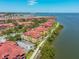 Stunning aerial view showcases condos with water views, offering a serene waterfront lifestyle at 2739 Via Capri # 1024, Clearwater, FL 33764