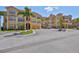 Beautiful condo with a large parking lot and palm trees, offering convenience and a tropical feel at 2739 Via Capri # 1024, Clearwater, FL 33764