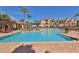 Relaxing community pool with ample lounge chairs, perfect for sunbathing and enjoying the outdoors at 2739 Via Capri # 1024, Clearwater, FL 33764