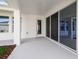 Spacious covered patio with seamless access to indoor living spaces at 28776 Rambutan Dr, Wesley Chapel, FL 33543