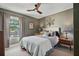 Comfortable bedroom with ample natural light, complemented by a decorative wall piece at 3001 58Th S Ave # 509, St Petersburg, FL 33712