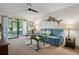 Comfortable living room featuring sliding doors that lead to a screened patio at 3001 58Th S Ave # 509, St Petersburg, FL 33712