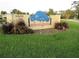 Community entrance sign for Arbor Grove with lush landscaping and manicured lawn at 3001 58Th S Ave # 509, St Petersburg, FL 33712