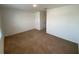Neutral bedroom featuring fresh paint and plush carpeting at 35003 Daisy Meadow Loop, Zephyrhills, FL 33541