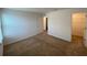 Neutral bedroom featuring fresh paint and plush carpeting at 35003 Daisy Meadow Loop, Zephyrhills, FL 33541