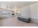 Enclosed sunroom features tile floors, sliding doors, and an exterior door at 37422 Neukom Ave, Zephyrhills, FL 33541