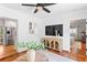 Dining area shows terra cotta tile floors, stylish decor and stainless-steel refrigerator at 432 39Th Ne Ave, St Petersburg, FL 33703