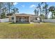 Large backyard featuring a hot tub, patio and vinyl privacy fence at 4344 Eldron Ave, North Port, FL 34286