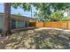 Spacious backyard featuring a covered patio, wooden fence, and plenty of room for activities at 4730 15Th N Ave, St Petersburg, FL 33713