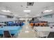 Spacious banquet hall with tables and chairs set for a large gathering or event at 5247 81St N St # 4, St Petersburg, FL 33709