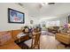 Spacious living and dining area with a blend of cozy seating, an open layout, and a view of the outdoors at 5247 81St N St # 4, St Petersburg, FL 33709