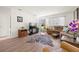 Bright living room with a zebra rug, modern decor, and an open doorway, enhancing the welcoming ambiance at 5247 81St N St # 4, St Petersburg, FL 33709
