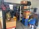 Well-stocked storage room with shelves and various equipment, maximizing space and organization at 57 Harbor Way # 24, Palm Harbor, FL 34684