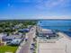 Aerial view of a vibrant beach community with waterfront dining and access to the pier at 5940 30Th S Ave # 206, Gulfport, FL 33707