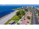 An aerial view of a beachside community featuring parking, recreational area and stunning waterfront views at 5940 30Th S Ave # 206, Gulfport, FL 33707