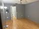 Inviting bedroom with wood-look flooring and neutral walls, creating a serene and comfortable atmosphere at 5940 30Th S Ave # 206, Gulfport, FL 33707