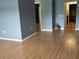 This room features neutral paint, wood-look flooring, and base trim, offering a bright and airy feel at 5940 30Th S Ave # 206, Gulfport, FL 33707