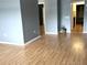 Open living room featuring sleek flooring and neutral-colored walls, creating a modern and inviting space at 5940 30Th S Ave # 206, Gulfport, FL 33707