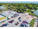 Aerial view of a waterfront restaurant with ample parking and outdoor dining options at 5940 30Th S Ave # 206, Gulfport, FL 33707