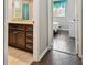 Bathroom and bedroom as seen through doorway at 6006 Chellas Ct, Lutz, FL 33558