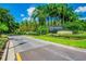 Cheval Golf and Country Club entrance with well-manicured landscaping and signage at 6006 Chellas Ct, Lutz, FL 33558