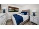Cozy bedroom with a comfortable bed, stylish décor and a view from the window at 6265 Sun Blvd # 115, St Petersburg, FL 33715