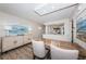 Dining area showcasing modern decor and a view into the kitchen at 6265 Sun Blvd # 115, St Petersburg, FL 33715