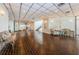 Spacious condo lobby with tile floors, staircase, and furniture at 6265 Sun Blvd # 115, St Petersburg, FL 33715