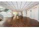 Large condo lobby with tile floors, staircase, and elevator at 6265 Sun Blvd # 115, St Petersburg, FL 33715
