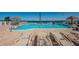 Enjoy this community pool with lounge chairs and beautiful water views at 6265 Sun Blvd # 115, St Petersburg, FL 33715