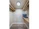 Walk-in closet with shelving and lighting providing efficient storage at 6265 Sun Blvd # 115, St Petersburg, FL 33715