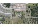 Expansive aerial view of property with surrounding neighborhood and nearby amenities at 6652 Simmons Loop, Riverview, FL 33578