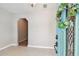 Inviting foyer featuring tiled flooring and an arched doorway to the living space at 6939 3Rd N St, St Petersburg, FL 33702