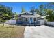 Charming single-Gathering home with a well-manicured lawn and a lovely front porch at 6939 3Rd N St, St Petersburg, FL 33702