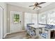 Bright kitchen nook featuring custom bench seating and a door to the exterior at 6939 3Rd N St, St Petersburg, FL 33702