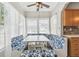 Charming kitchen nook with custom seating and plenty of natural light at 6939 3Rd N St, St Petersburg, FL 33702