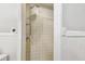 Shower featuring tile surround and adjustable shower head at 6939 3Rd N St, St Petersburg, FL 33702