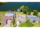 Aerial view of the property highlighting the home, backyard, waterfront, and neighborhood at 775 S Bayshore Blvd, Safety Harbor, FL 34695