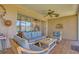 Cozy sunroom featuring comfortable seating and scenic water views at 775 S Bayshore Blvd, Safety Harbor, FL 34695