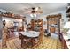 Inviting dining room with a round table, decorative accents, and hardwood floors at 117 Myrtle Ln, Plant City, FL 33565