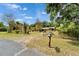 Spacious front yard with mature trees and landscaping; a peaceful, quiet retreat at 117 Myrtle Ln, Plant City, FL 33565